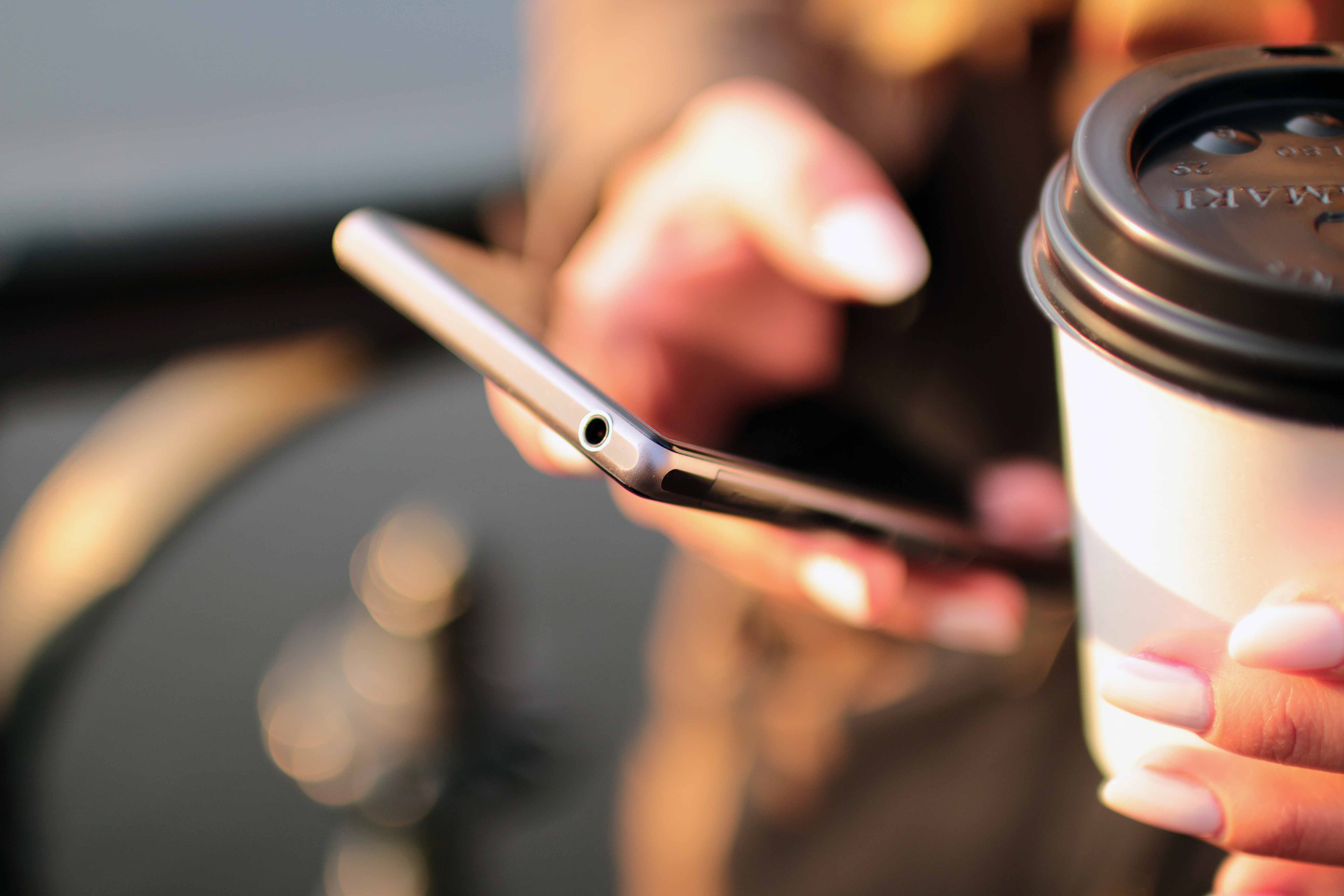 Image of someone using their phone for contact support for Berry Wing